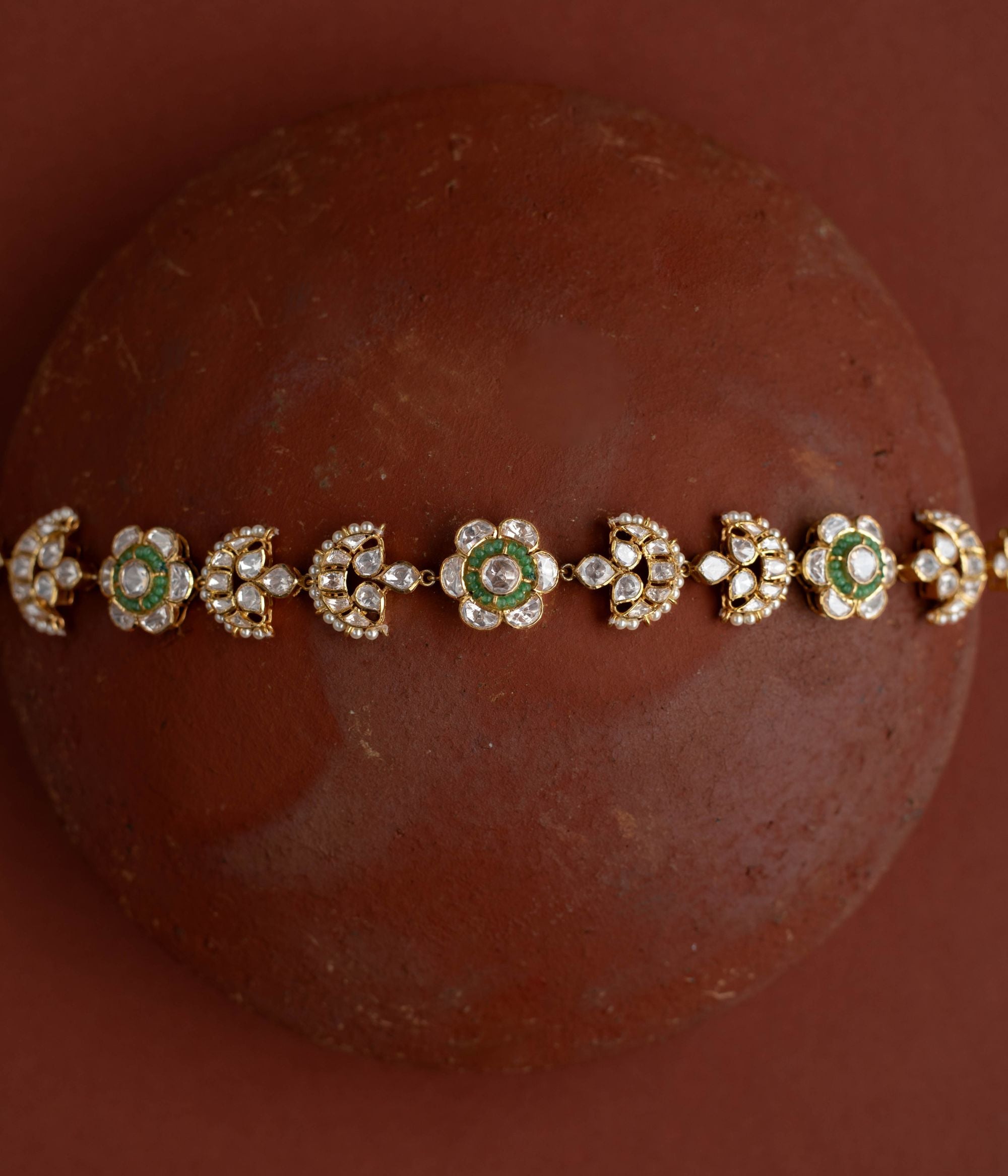 whimsical elegance with Polki and beads florals in gold-plated silver, evoking boundless stories.