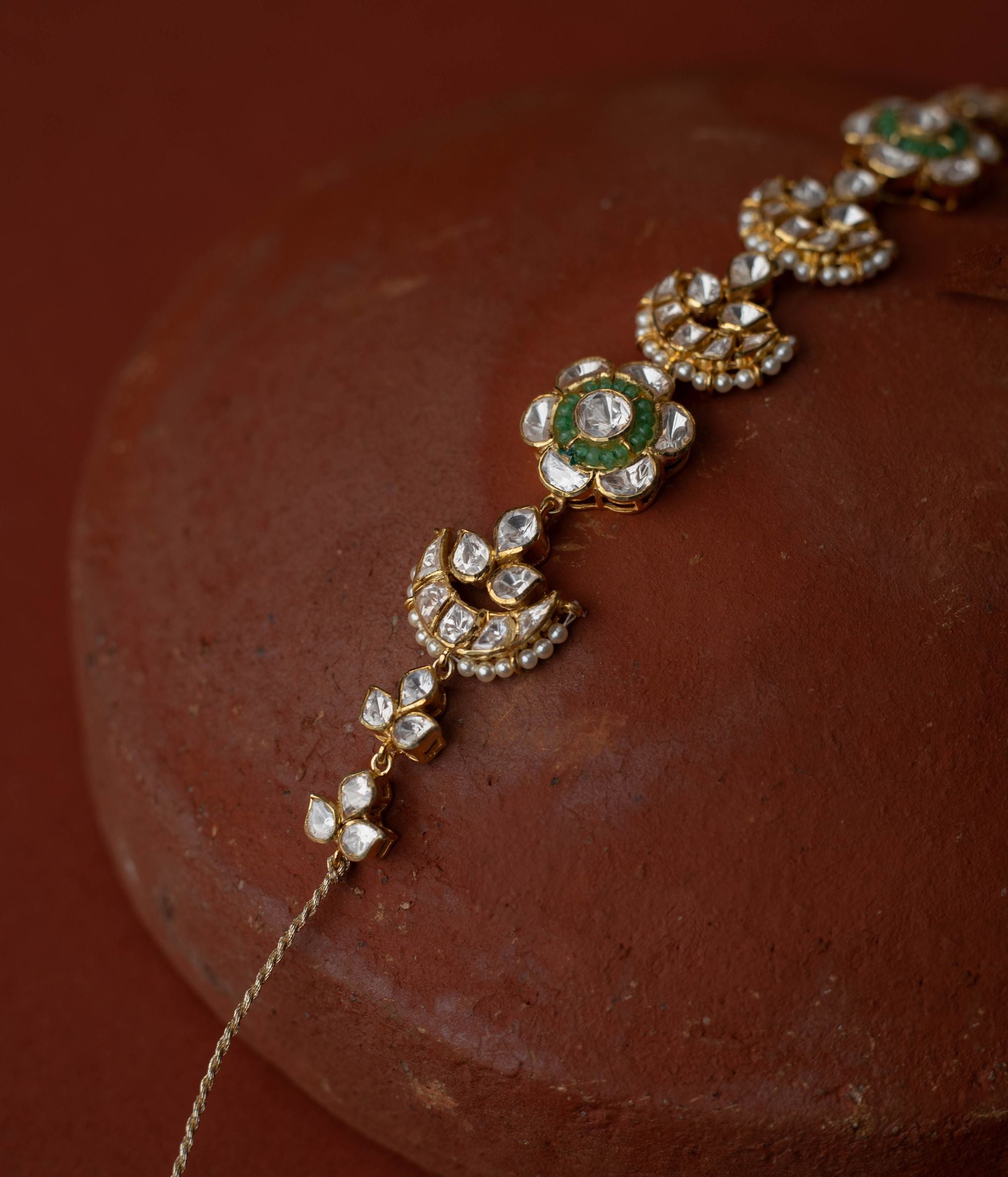 whimsical elegance with Polki and beads florals in gold-plated silver, evoking boundless stories.