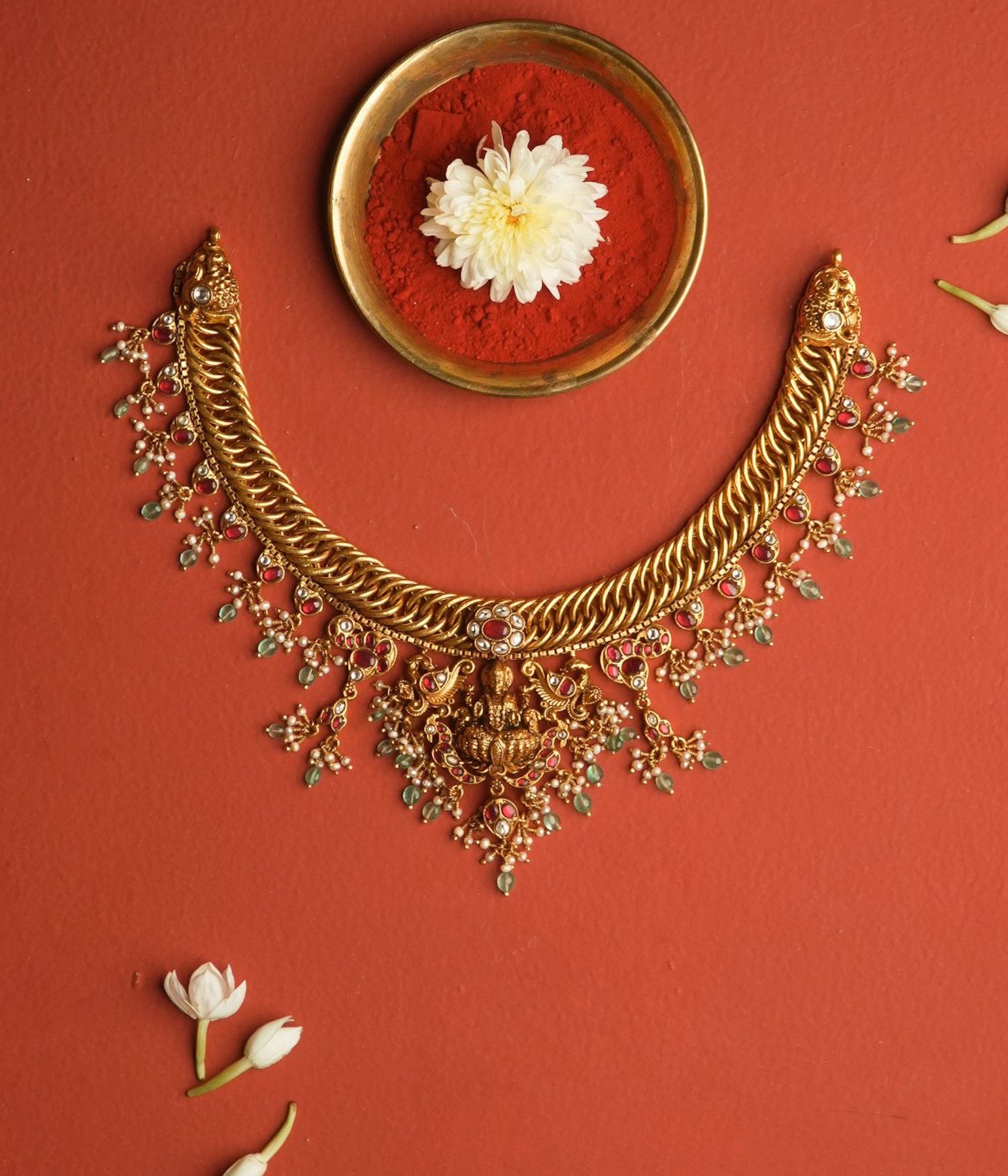 Silver temple necklace with red and green Kundan stones