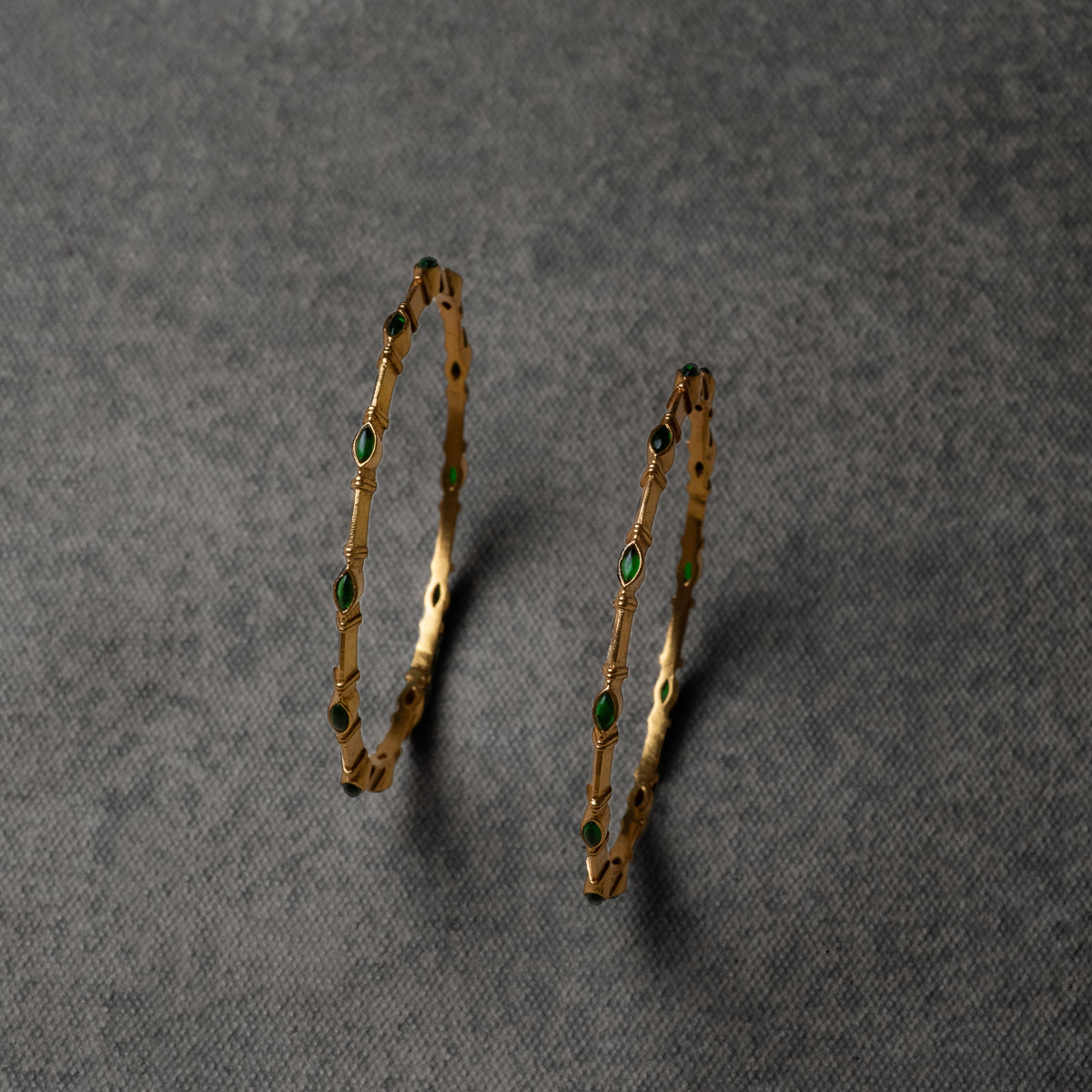Anvika silver bangle with green spinel stones
