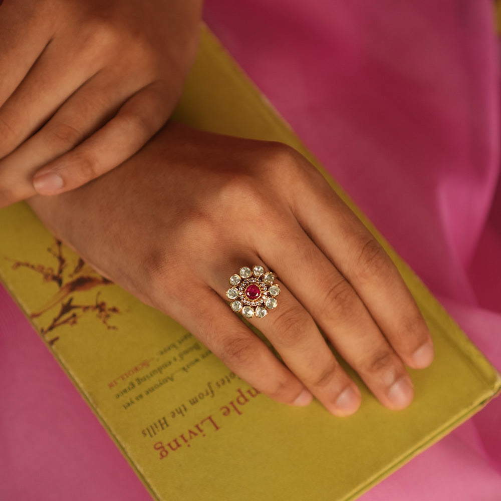 Blossoming beauty! Red spinel ring: A radiant ruby center embraced by shimmering CZ stones, echoing love and timeless grace.