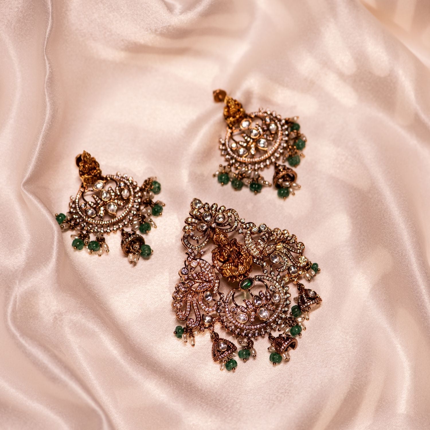 Avaa silver pendant with antique gold plating and Polki stones