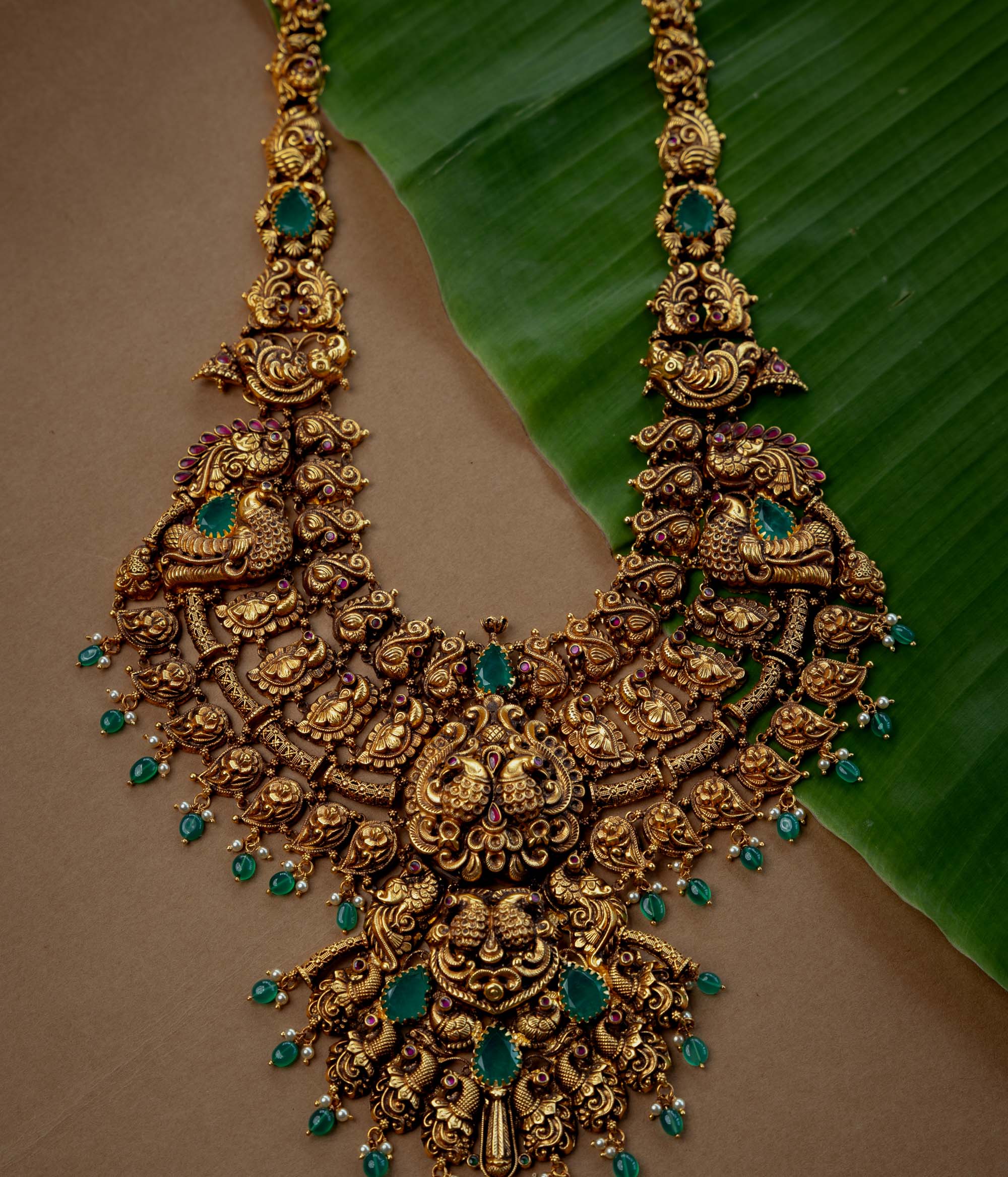 Temple Necklace with Red Kundan Stone, Green Kundan Stone, Green Beads and Pearls, themed around Heritage.