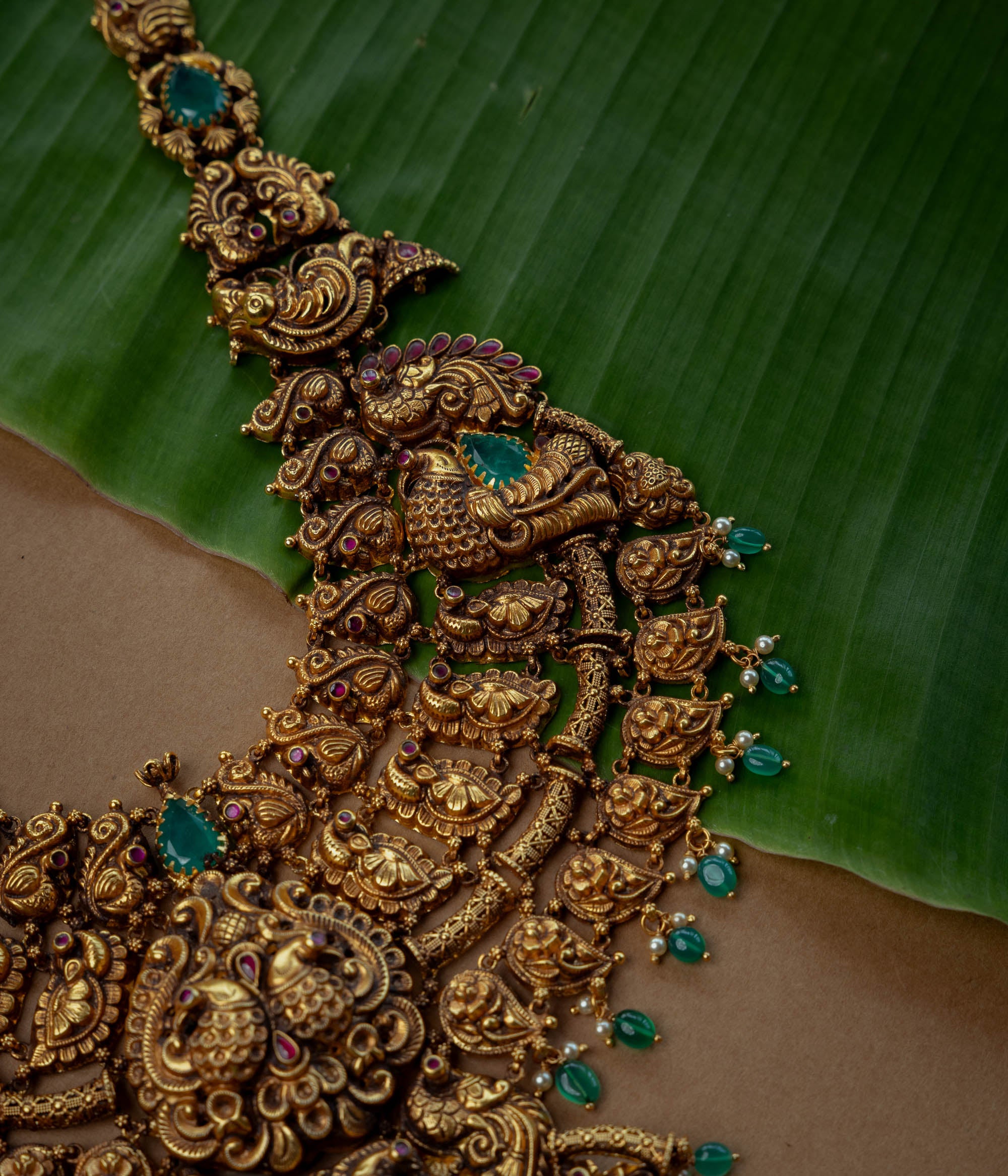 Temple Necklace with Red Kundan Stone, Green Kundan Stone, Green Beads and Pearls, themed around Heritage.