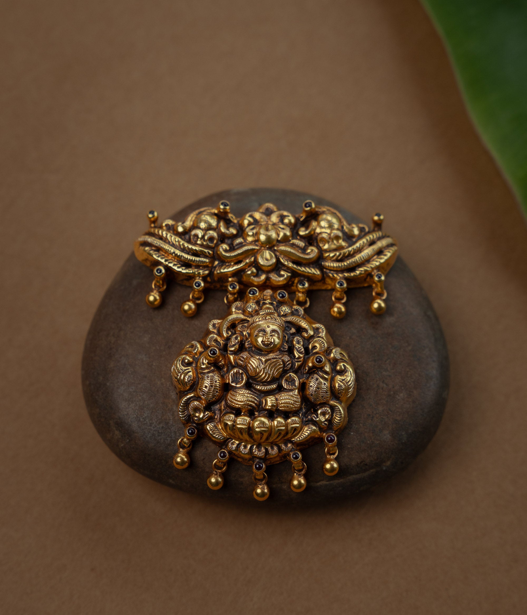 Temple pendant with twin peacocks and Garuda, studded with Red Spinal Stones