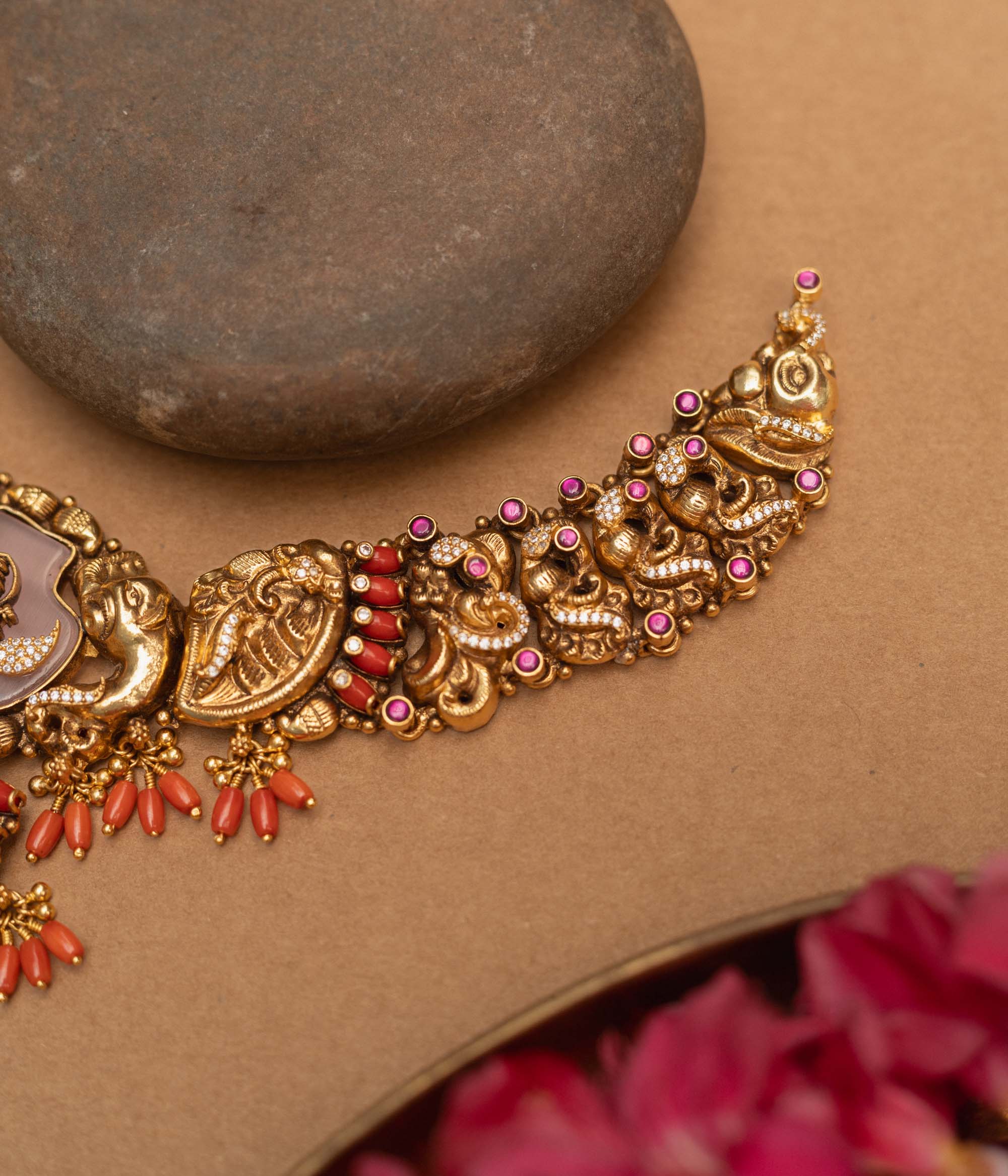 Antique gold-finished 92.5 sterling silver Nakshi necklace featuring intricately handcrafted mythical creatures and traditional motifs with vibrant gemstones, exuding timeless artistry and spiritual grace.