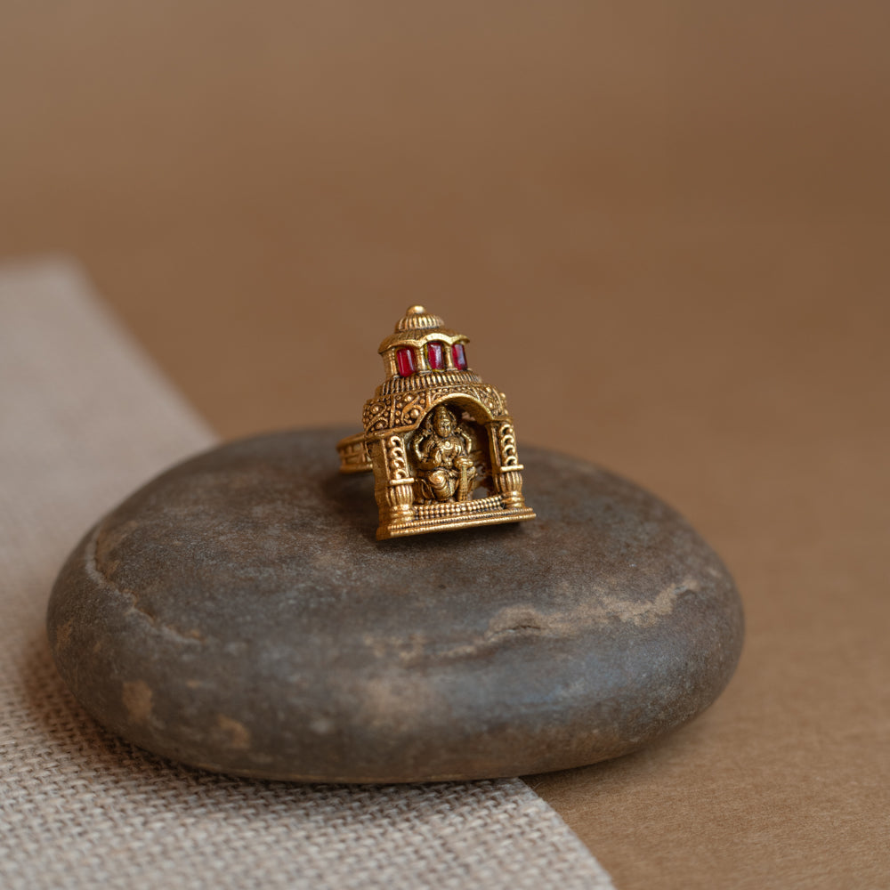 Temple ring with white Polki stone, traditional circular design, elegant for festive and cultural wear.