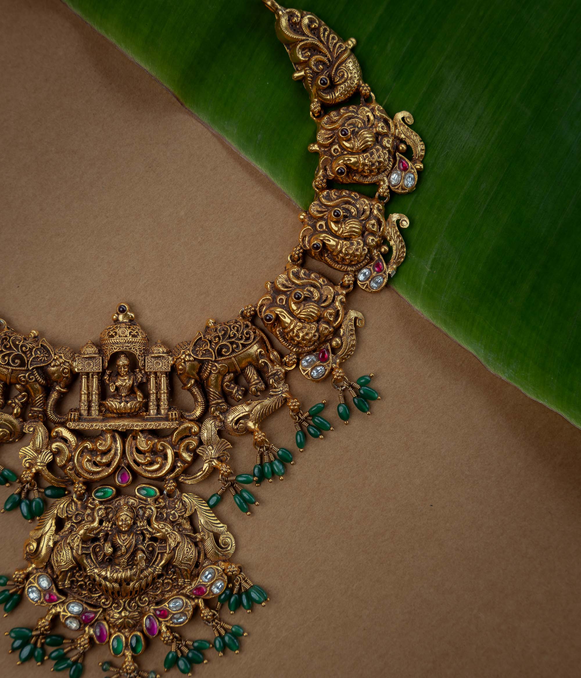 Ornate temple kundan and pearl necklace