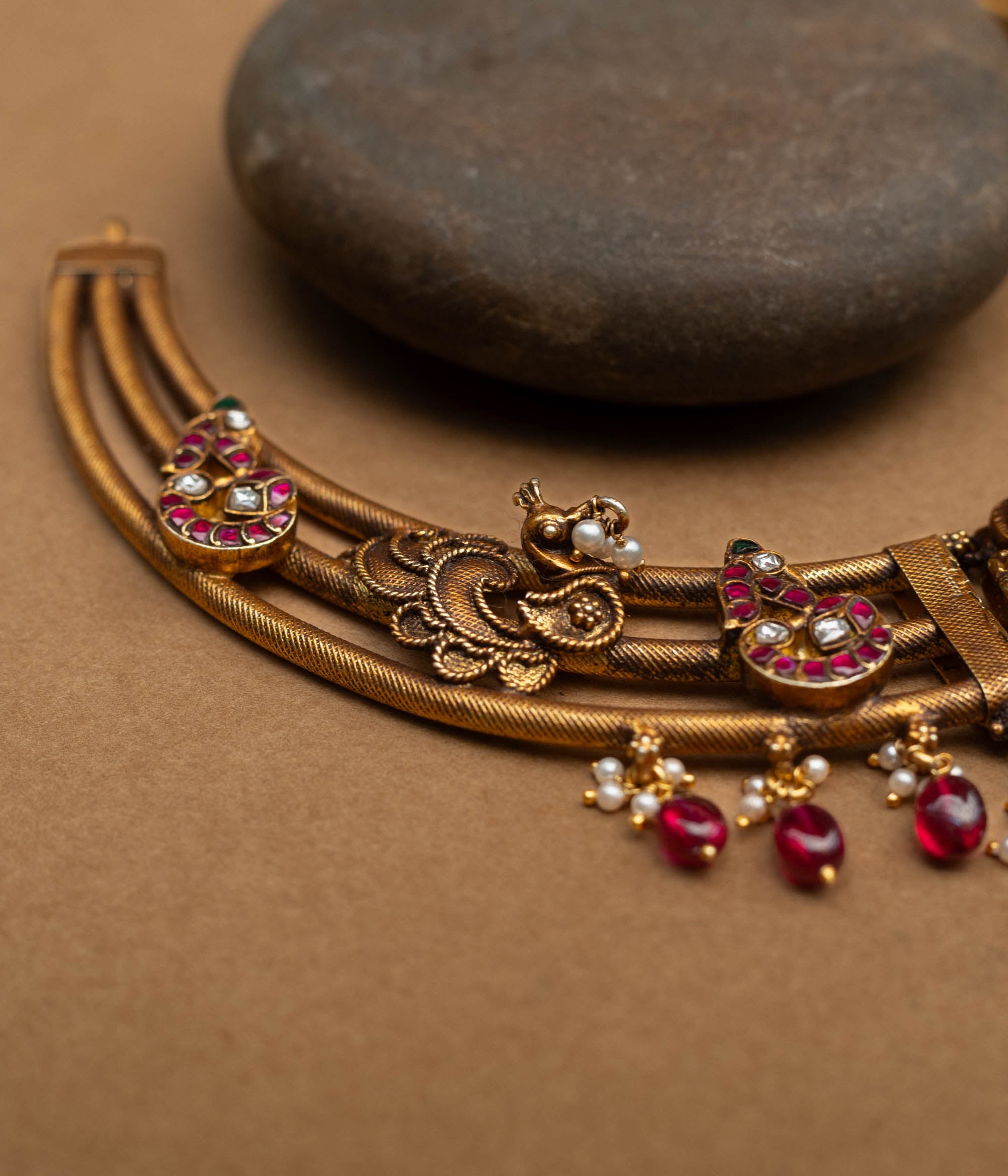 A majestic 92.5 sterling silver Meenakshi Temple Heritage Necklace, featuring a grand Lakshmi pendant, ruby red drops, and intricate meenakari paisley motifs, radiating divine elegance and royal charm for bridal and festive wear.
