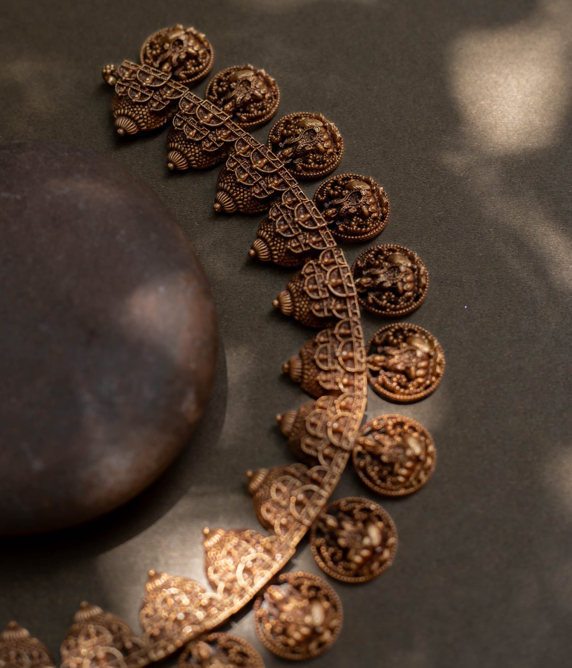 A striking 92.5 sterling silver necklace featuring intricately crafted coins depicting the Goddess (Devi) with an antique gold plating, blending traditional Indian artistry with spiritual significance, perfect for festive and cultural celebrations