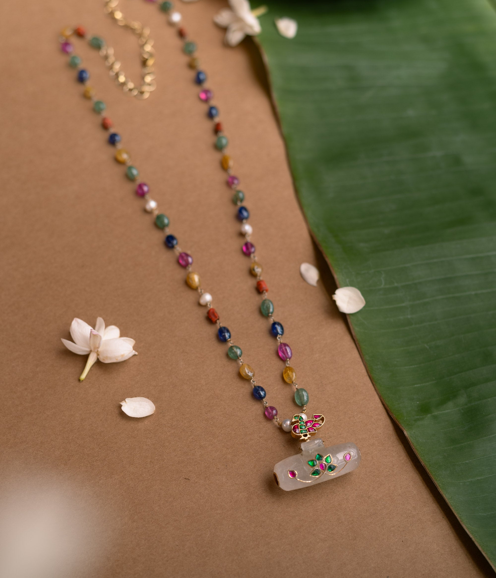 Hue Collection Celestial Harmony Necklace with multi-colored gemstone beads and floral enamel pendant.