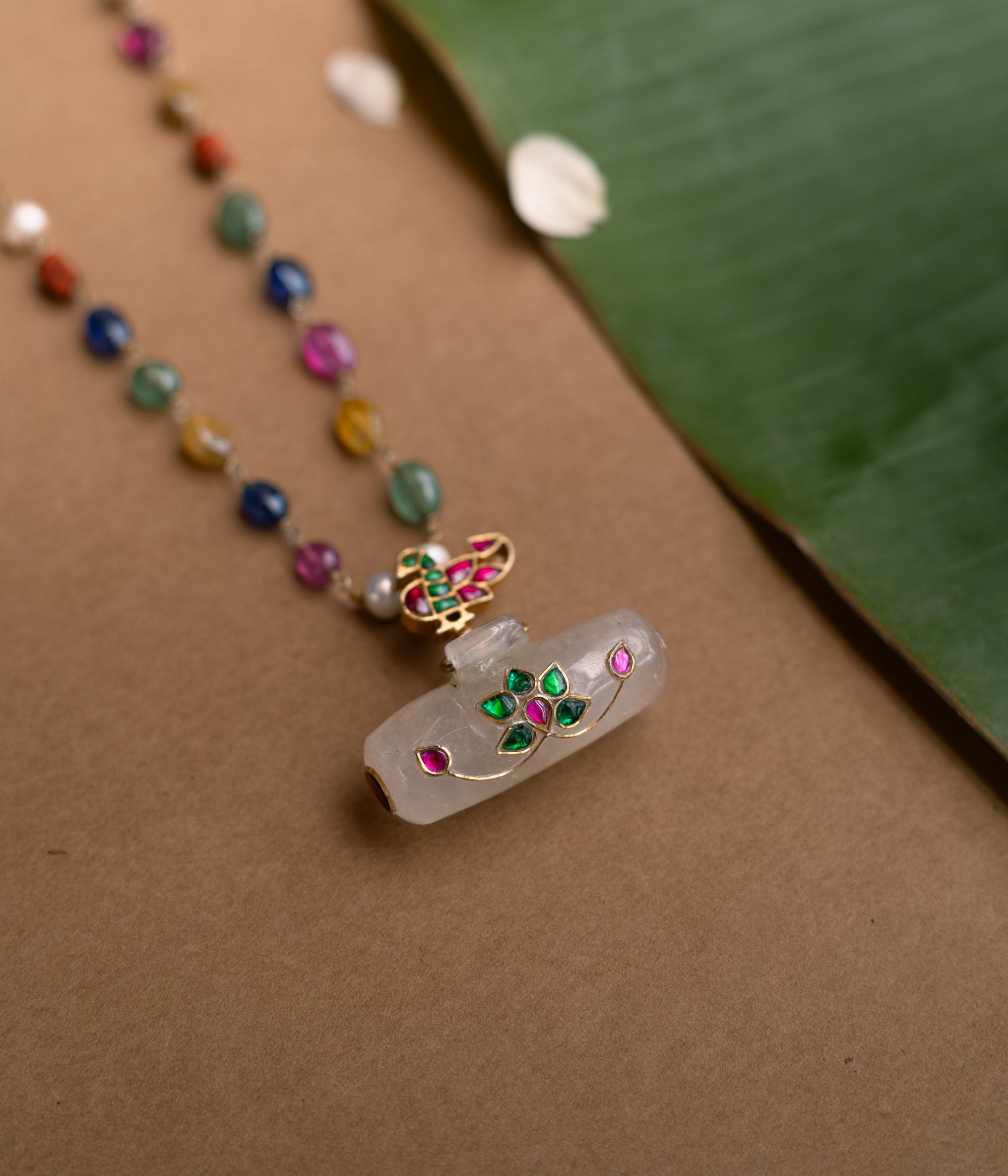 Hue Collection Celestial Harmony Necklace with multi-colored gemstone beads and floral enamel pendant.