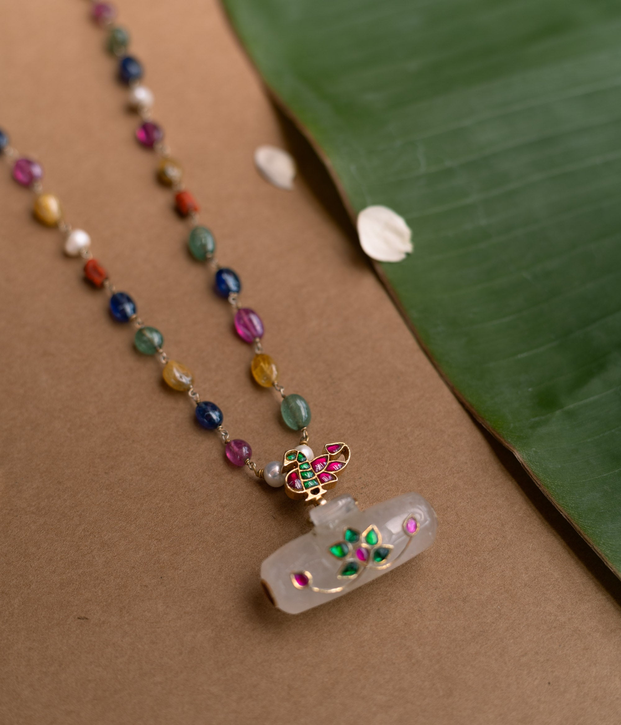 Hue Collection Celestial Harmony Necklace with multi-colored gemstone beads and floral enamel pendant.