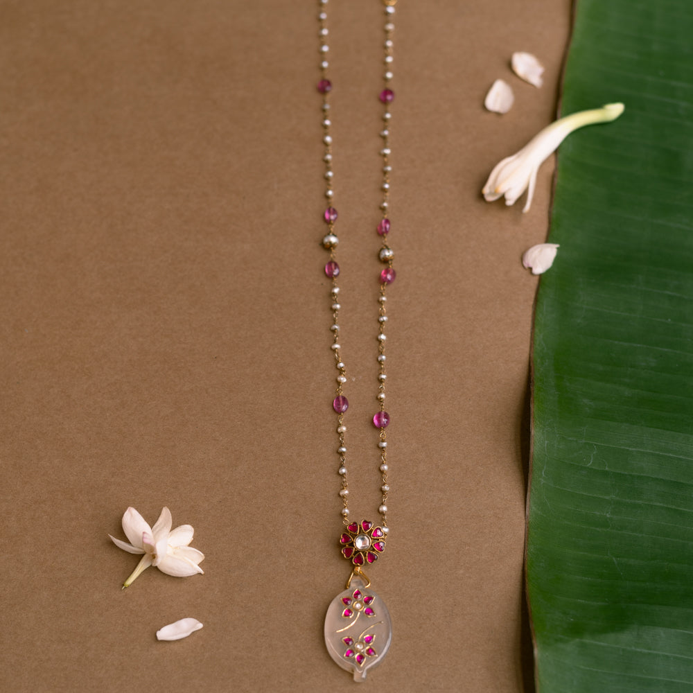 Hue Collection Blossom Whisper Necklace with pearls, pink beads, and floral pendant design.