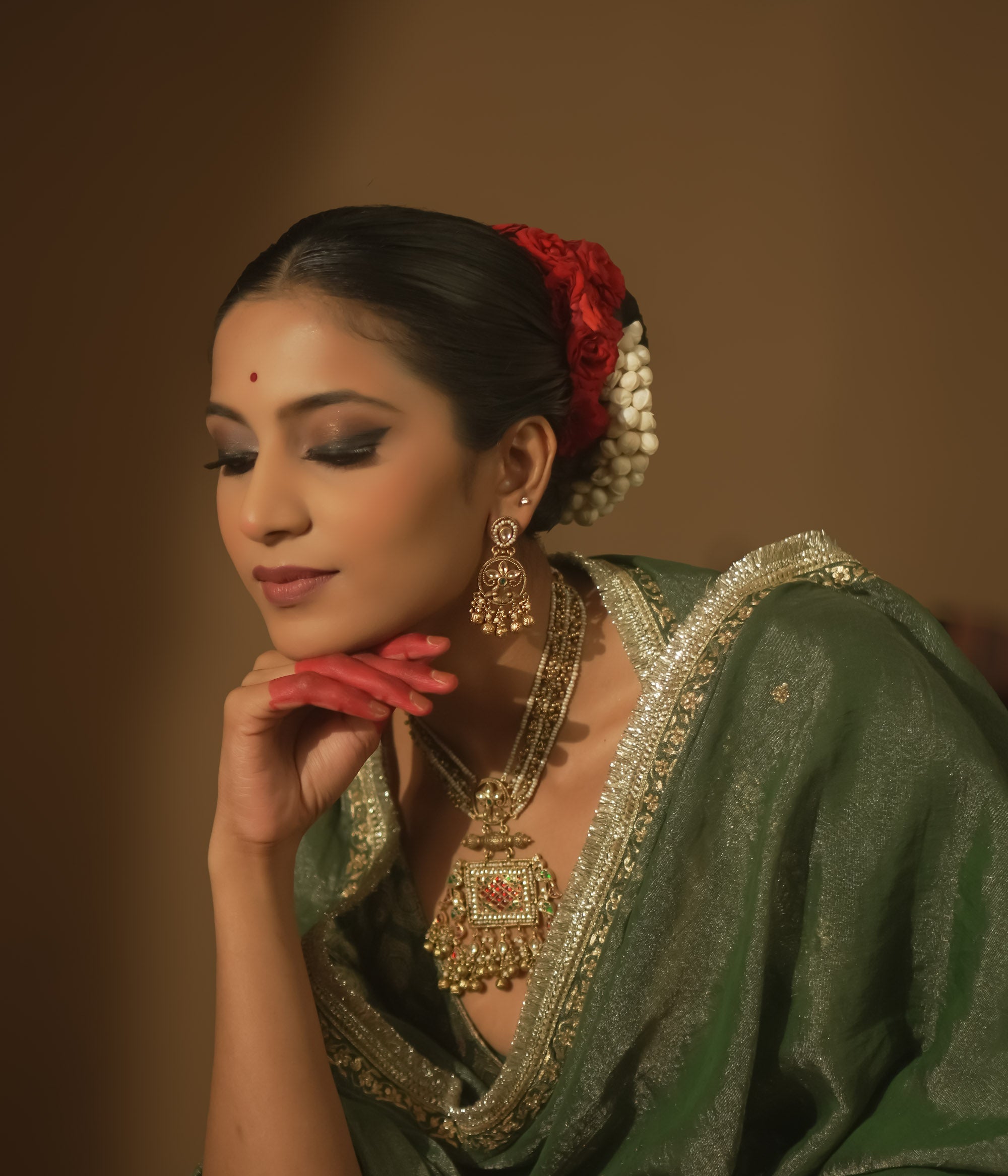 A delicate green gem, a whisper of traditional elegance.