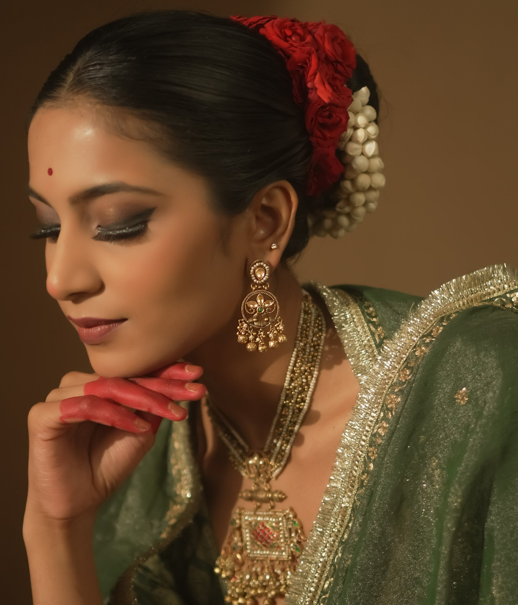 A delicate green gem, a whisper of traditional elegance.