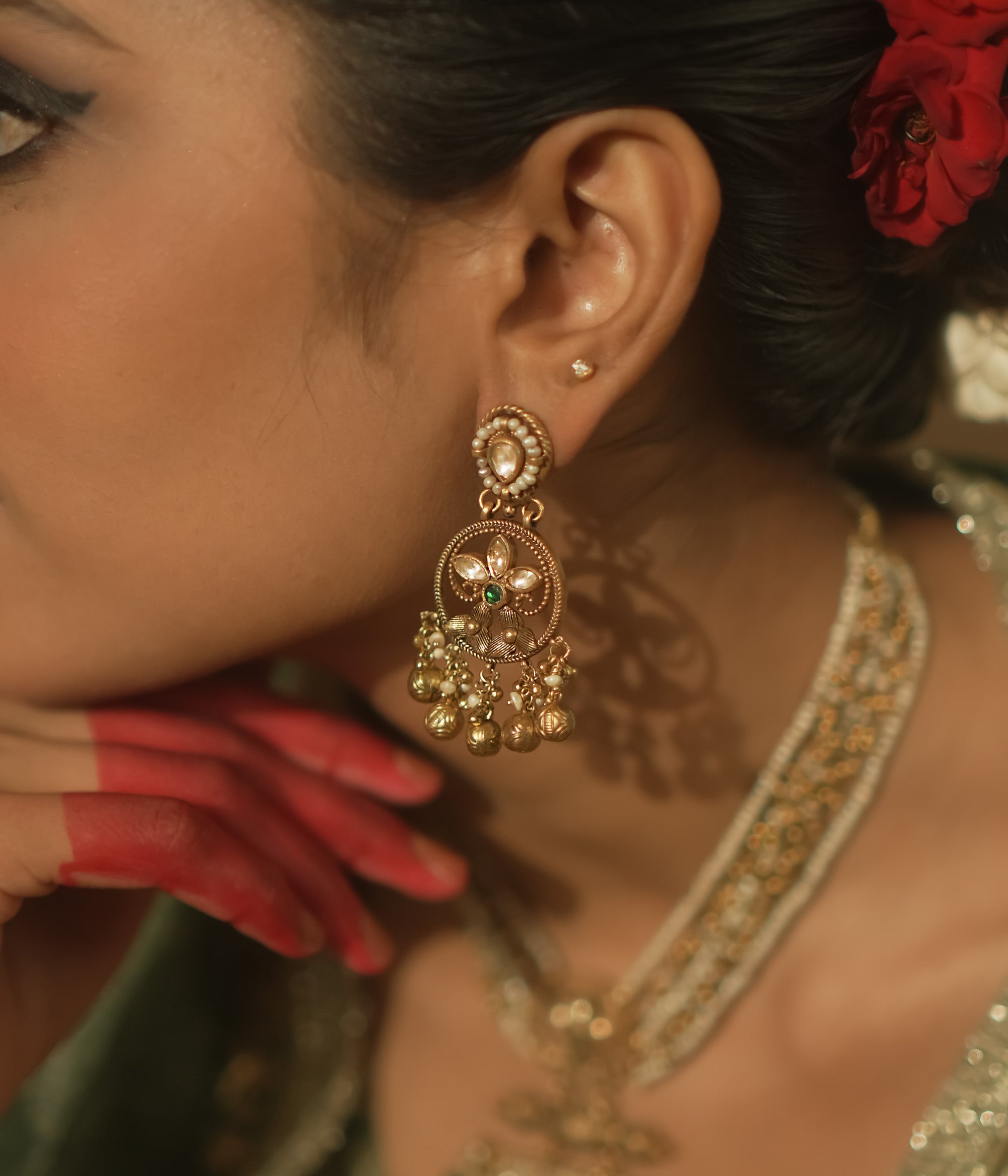 A delicate green gem, a whisper of traditional elegance.