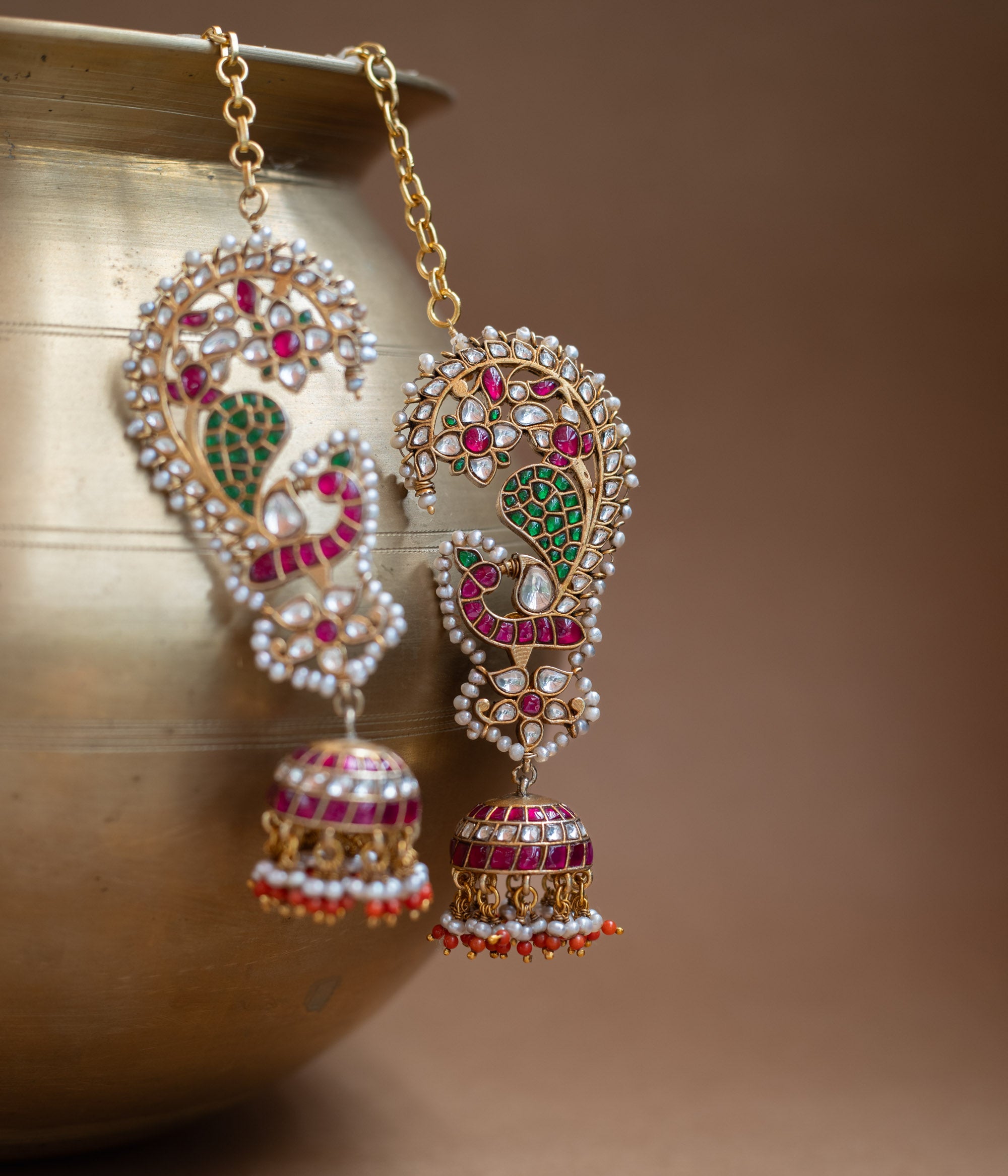 Kundan Collection paisley earrings with red, green, white kundan stones and pearl jhumka design.