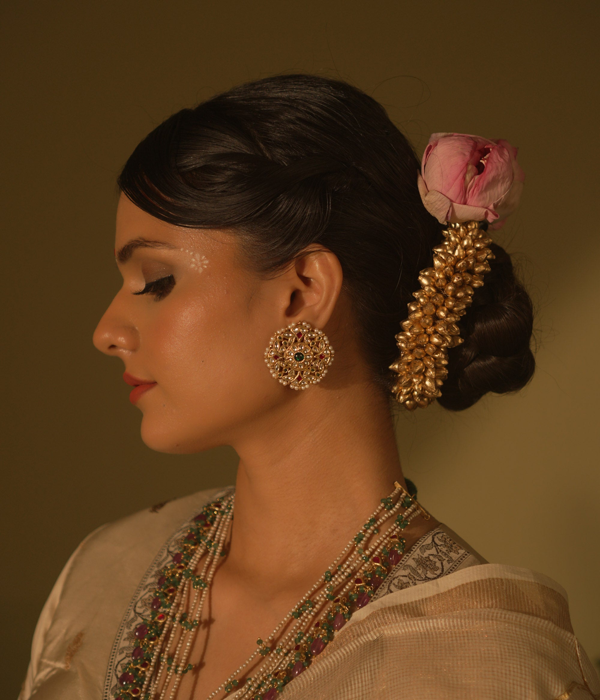  Floral Kundan ear studs with pearls—delicate, vibrant, and full of gentle morning charm.