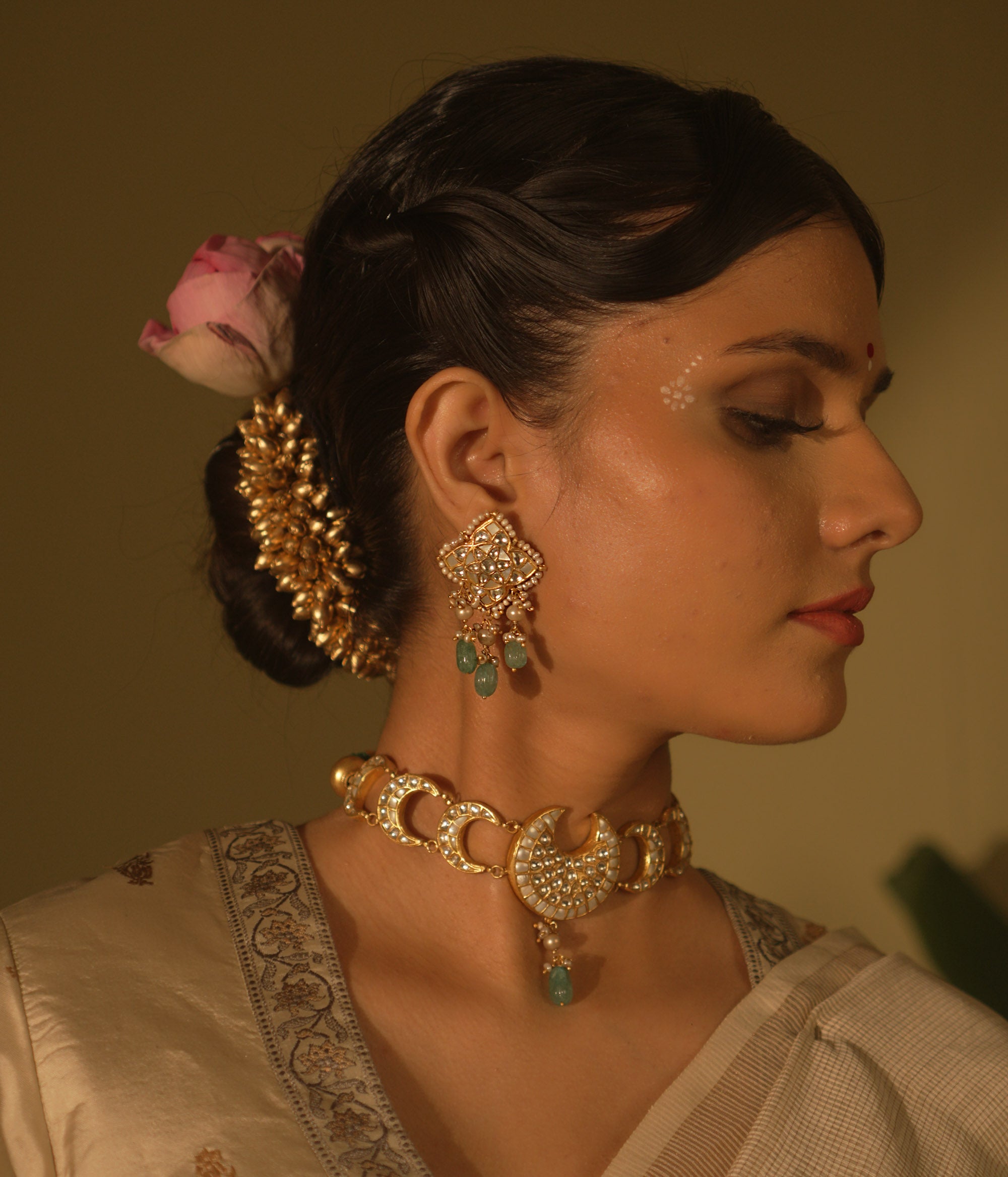 Galaxy-inspired Polki earrings with pearls and gemstones—cosmic charm in an artistic silhouette.