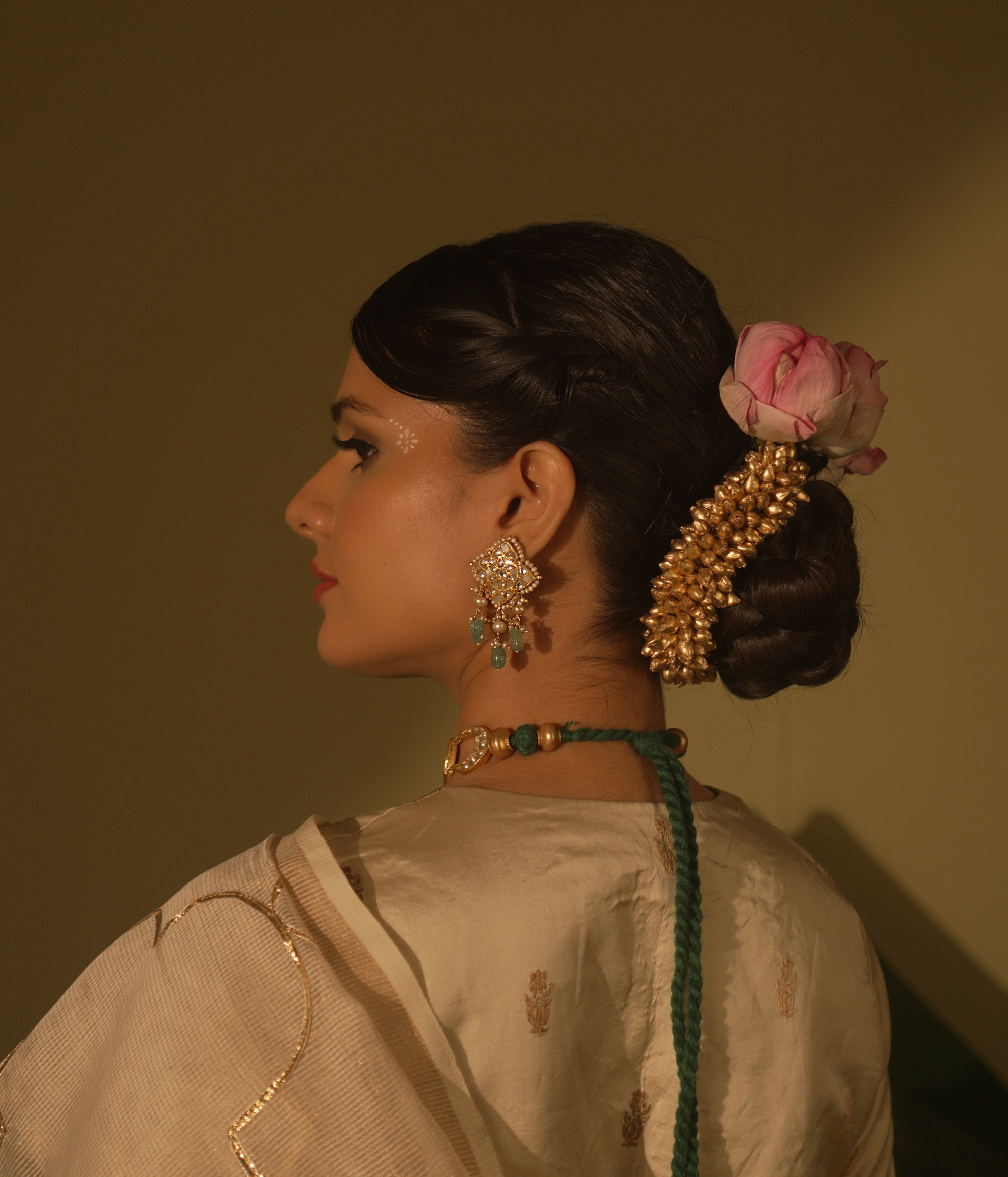 Galaxy-inspired Polki earrings with pearls and gemstones—cosmic charm in an artistic silhouette.