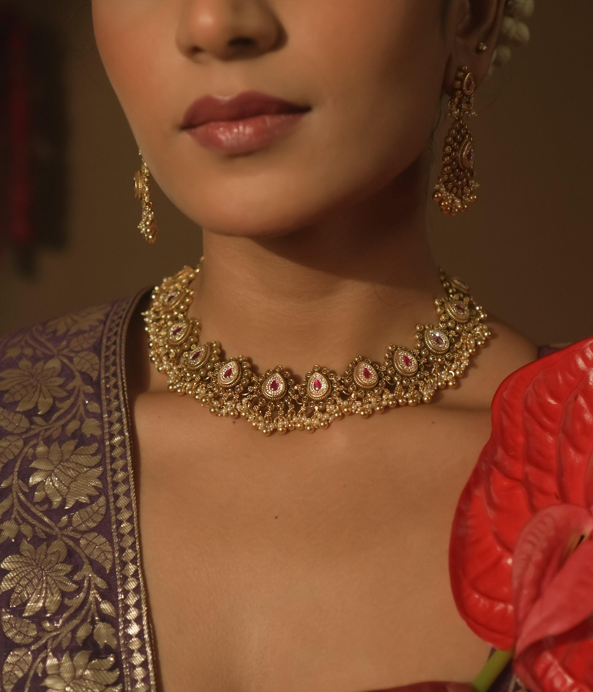 Gold-plated silver necklace with pink cultured rubies and tiny pearl balls.