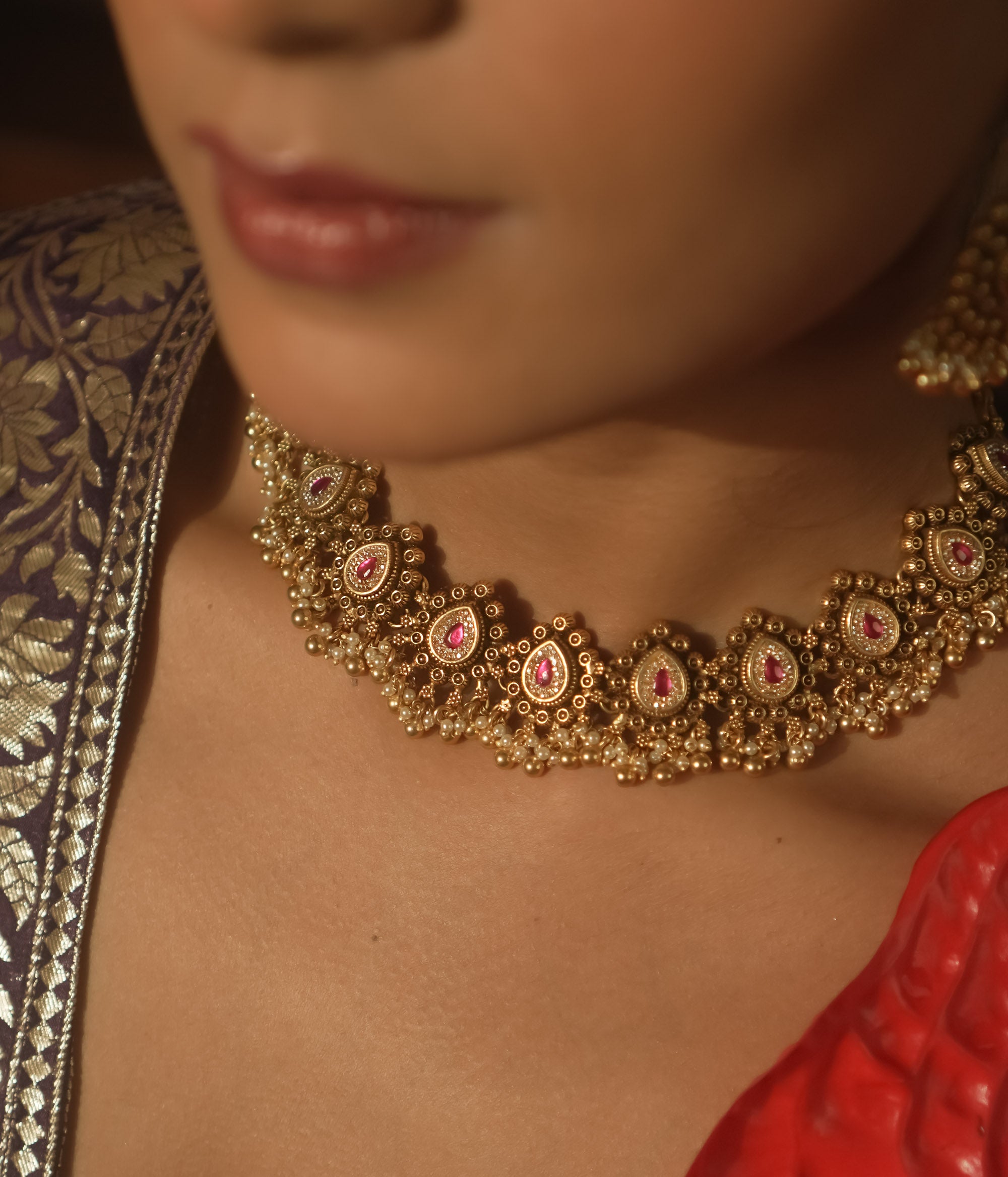Gold-plated silver necklace with pink cultured rubies and tiny pearl balls.