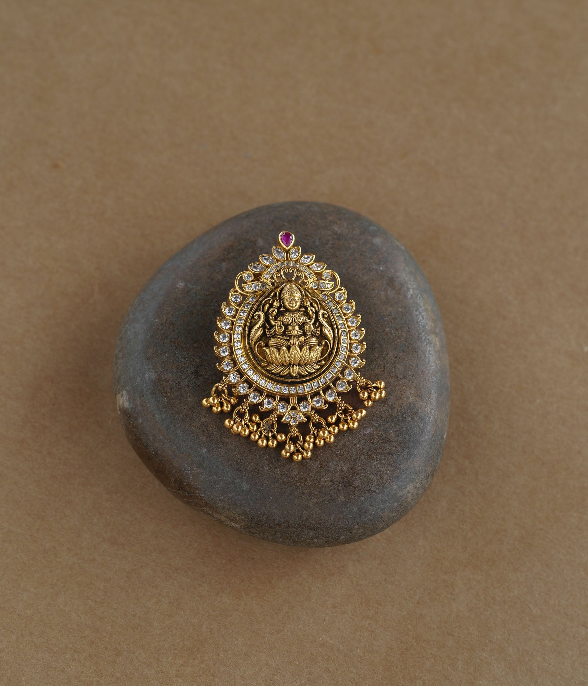 Goddess Lakshmi silver pendant with red spinal stone and CZ stones