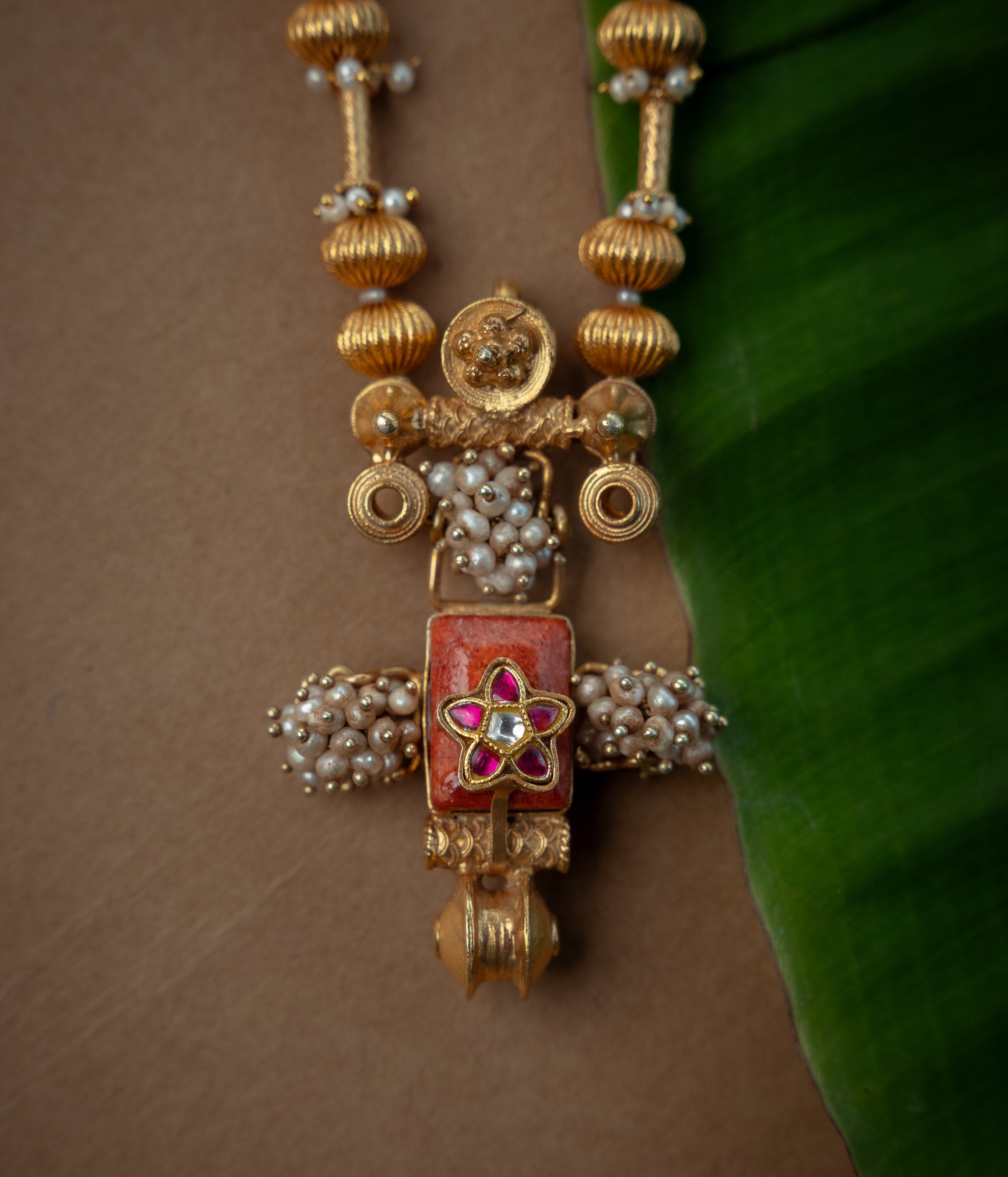 Trible Necklace with Red Kundan Stone, White Kundan Stone and Preals., themed around Garuda.
