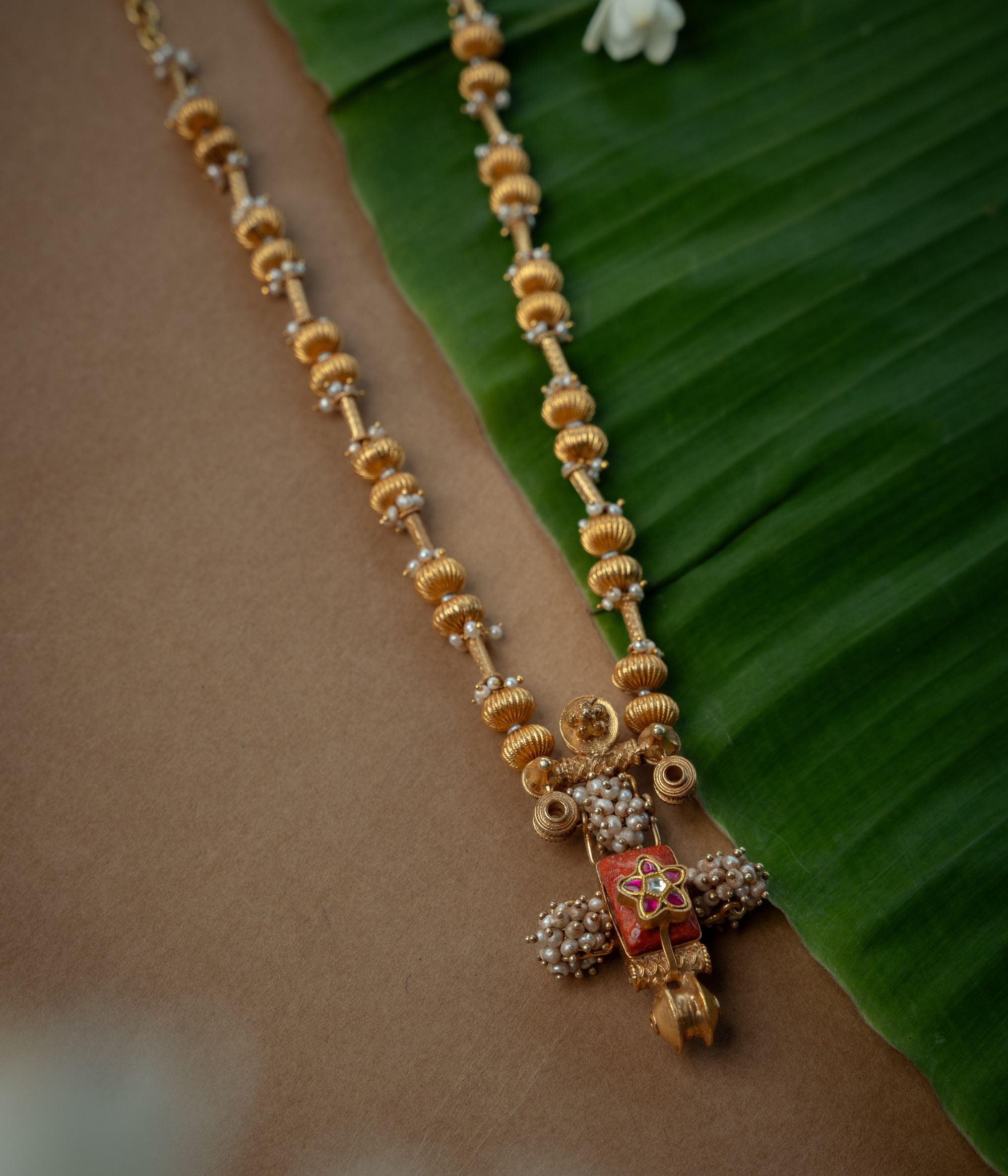 Trible Necklace with Red Kundan Stone, White Kundan Stone and Preals., themed around Garuda.