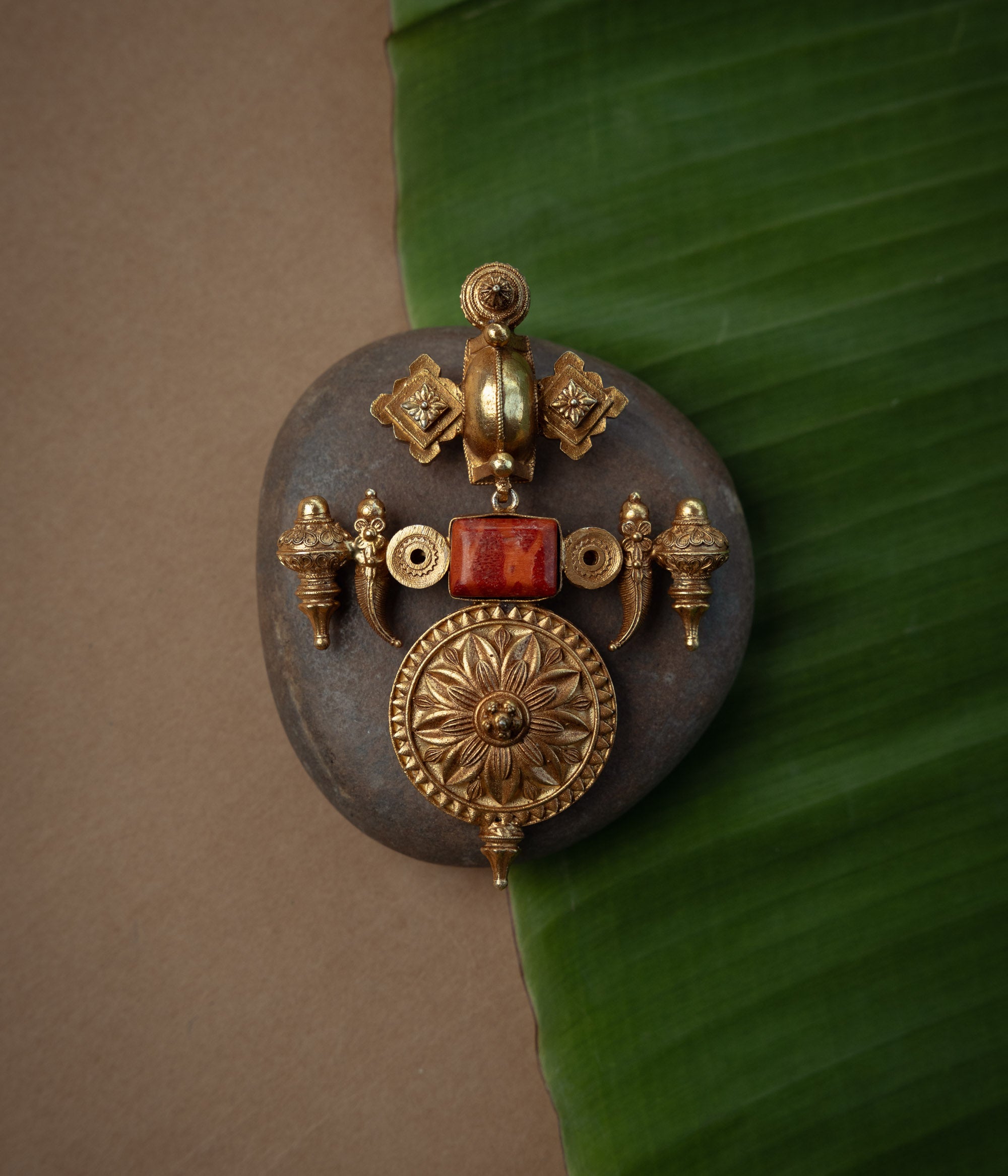 Trible Pendant with nan, themed around Heritage.