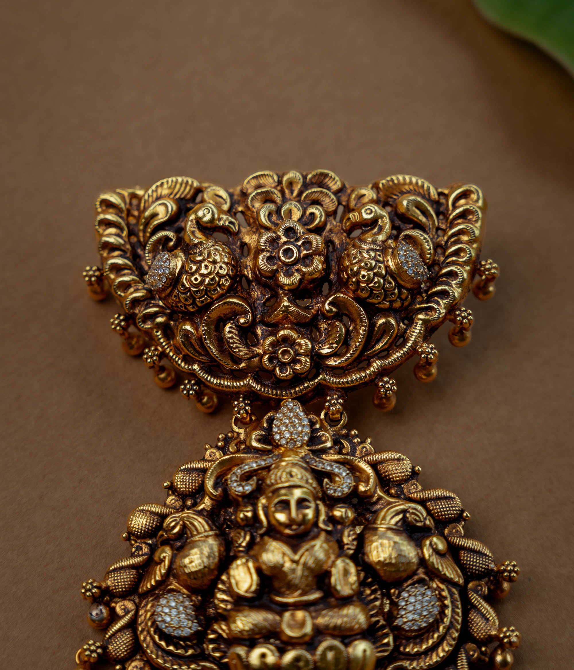 CZ stone temple pendant, glimmering circle