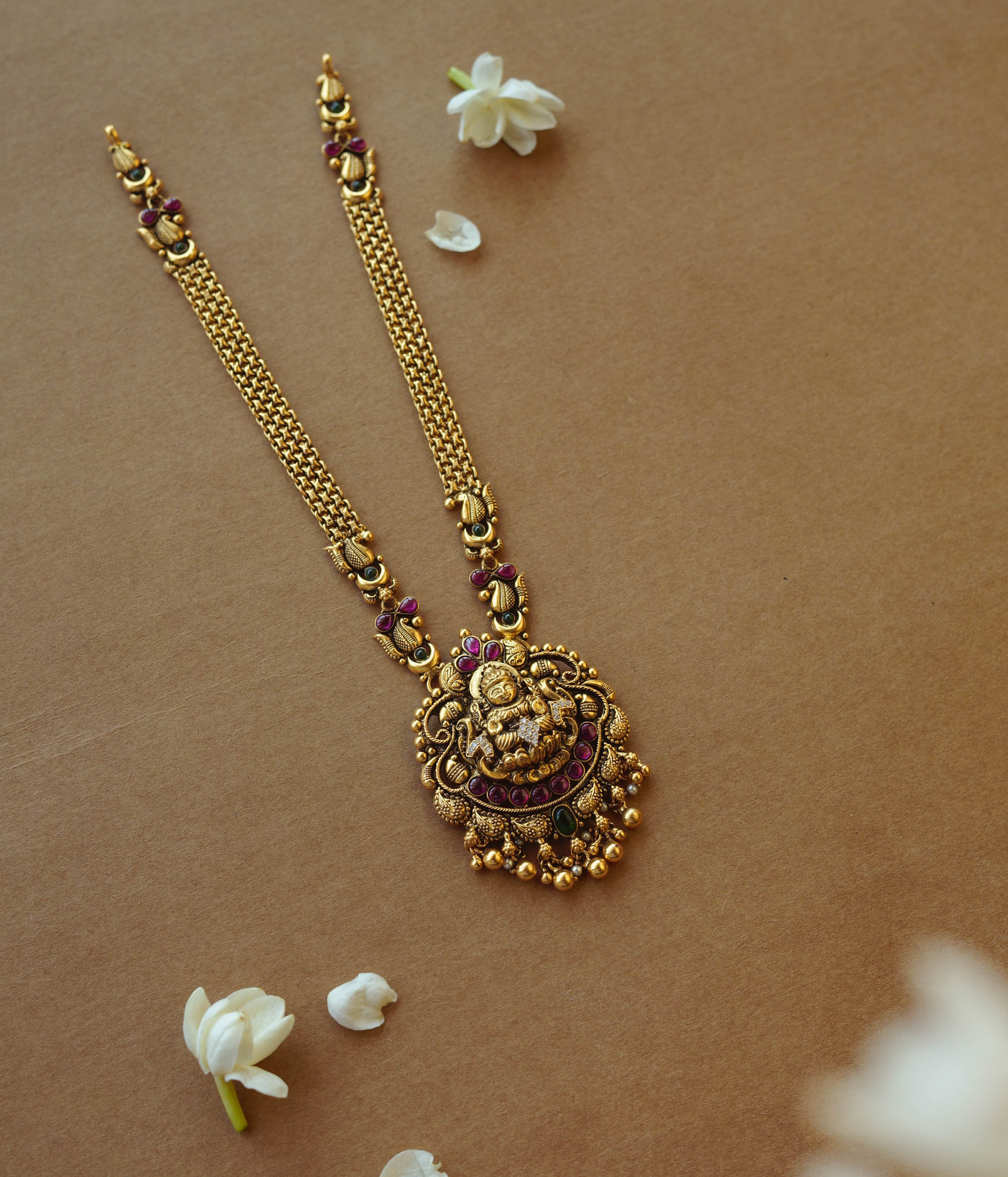 Golden temple necklace with intricate goddess-inspired design for divine elegance and cultural charm.
Main Description: