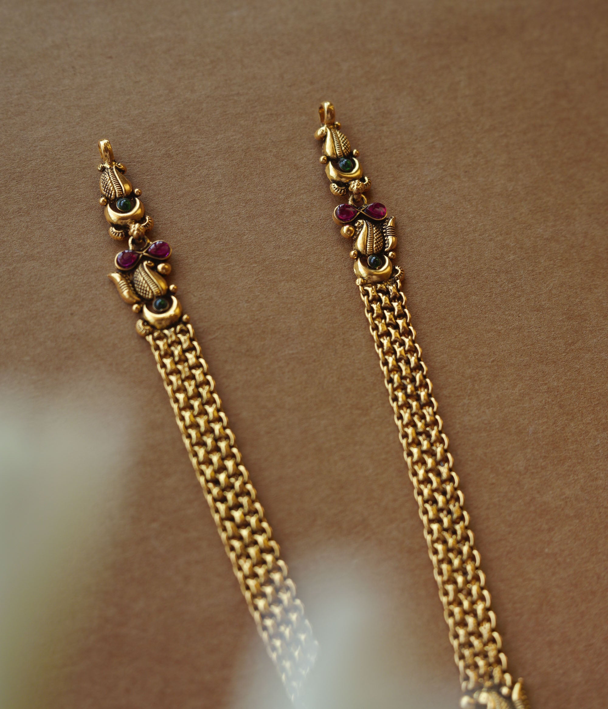 Golden temple necklace with intricate goddess-inspired design for divine elegance and cultural charm.
Main Description: